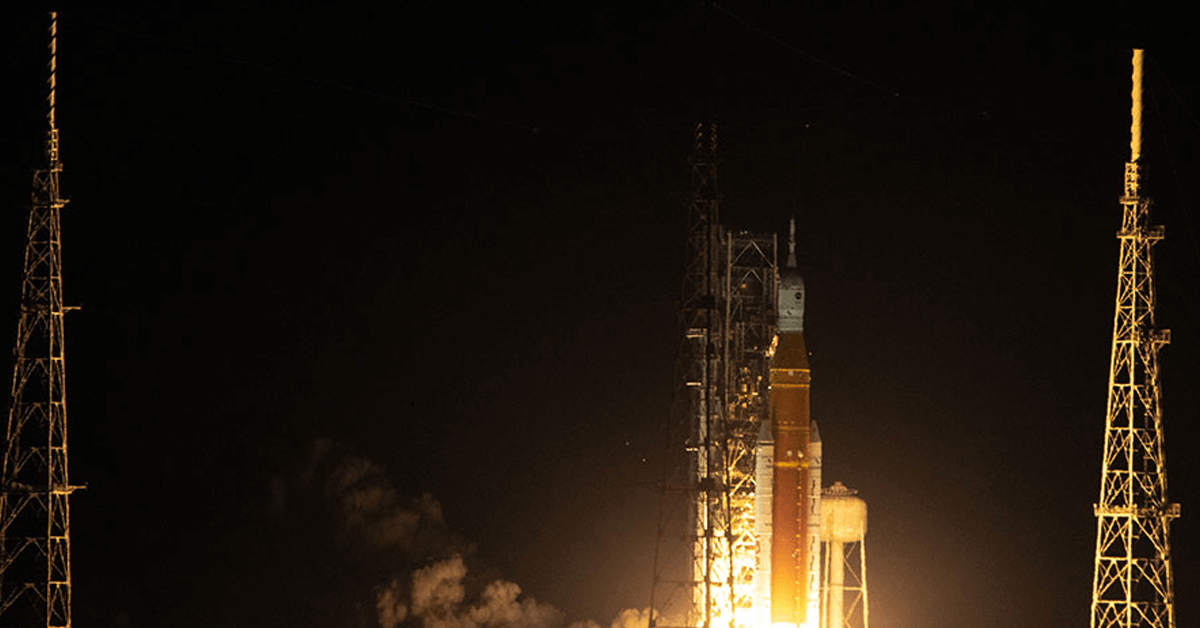Wide shot of a NASA Space Launch System rocket being launched