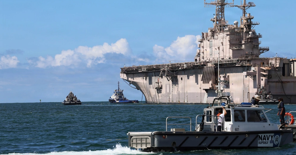 Tugboats escort the decommissioned USS Peleliu for a combined sinking exercise as part of RIMPAC 2026. Source: US Navy USS Peleliu. The former USS Peleliu at RIMPAC 2026